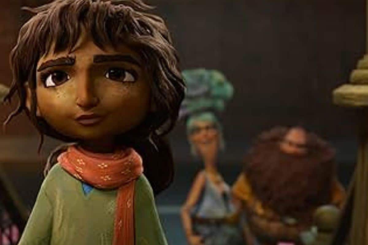 Personnages animés en conversation, écharpe orange visible.