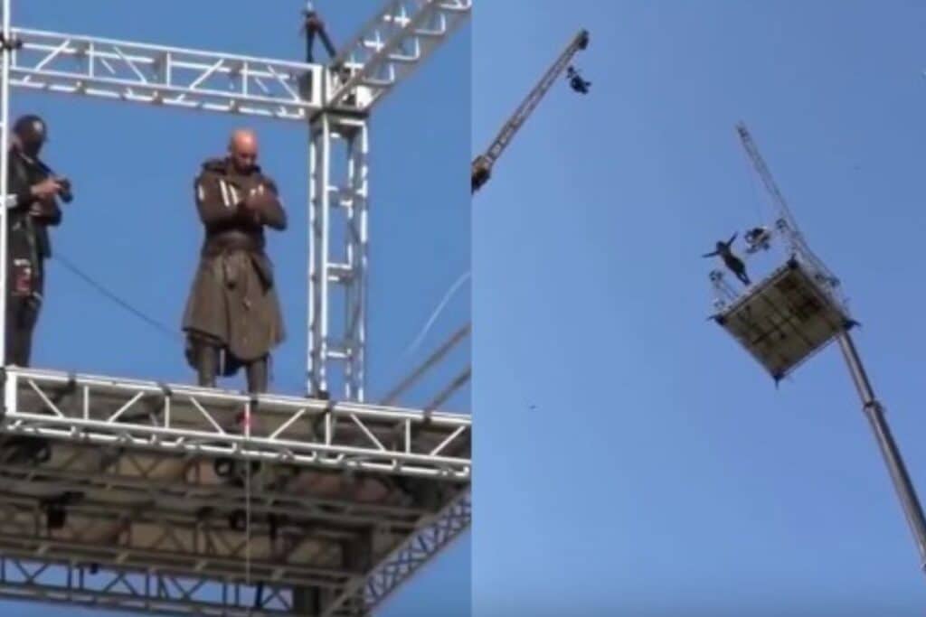 Personne sautant depuis une plateforme élevée.