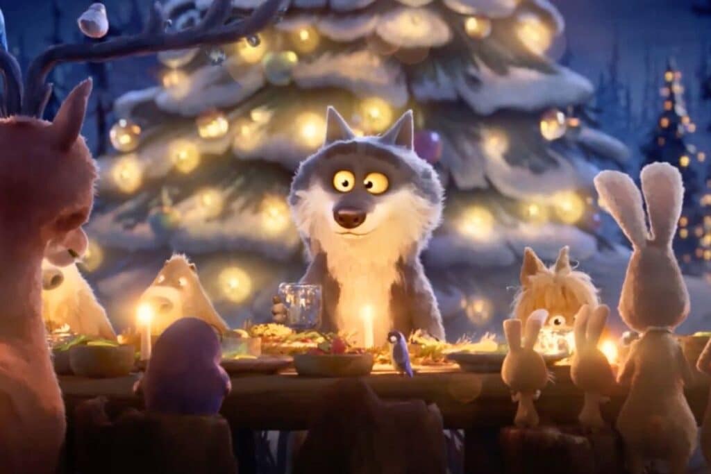 Animaux autour d'une table, repas festif nocturne.