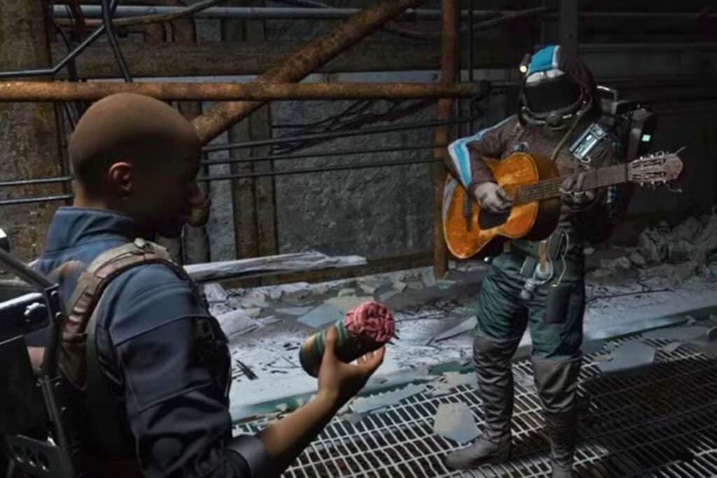 Personne en habit spatial joue de la guitare.