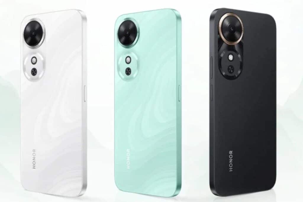 Trois smartphones Honor, blanc, vert, noir.