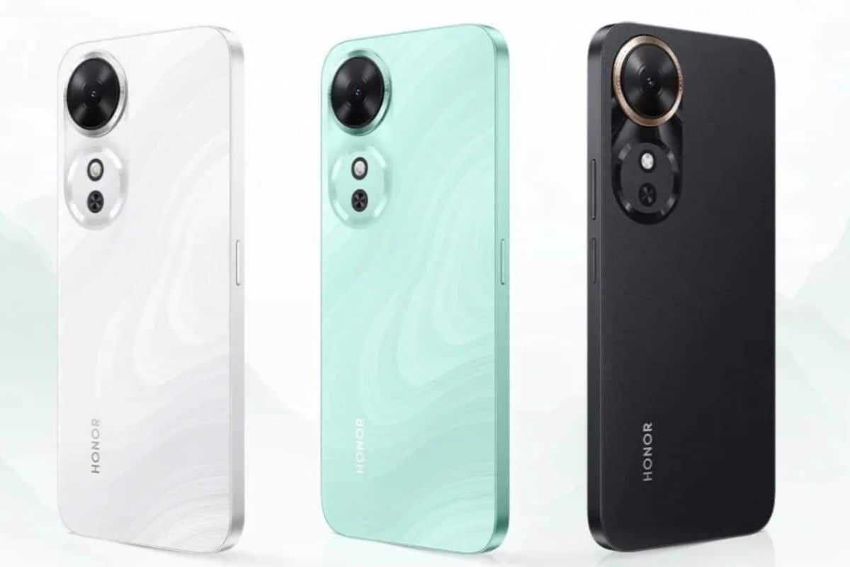 Trois smartphones Honor, blanc, vert, noir.