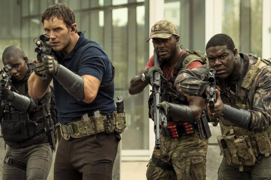 Quatre soldats armés en position de tir.