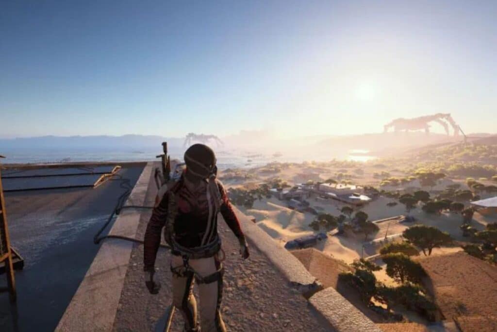 Personnage sur toit désertique au coucher du soleil.