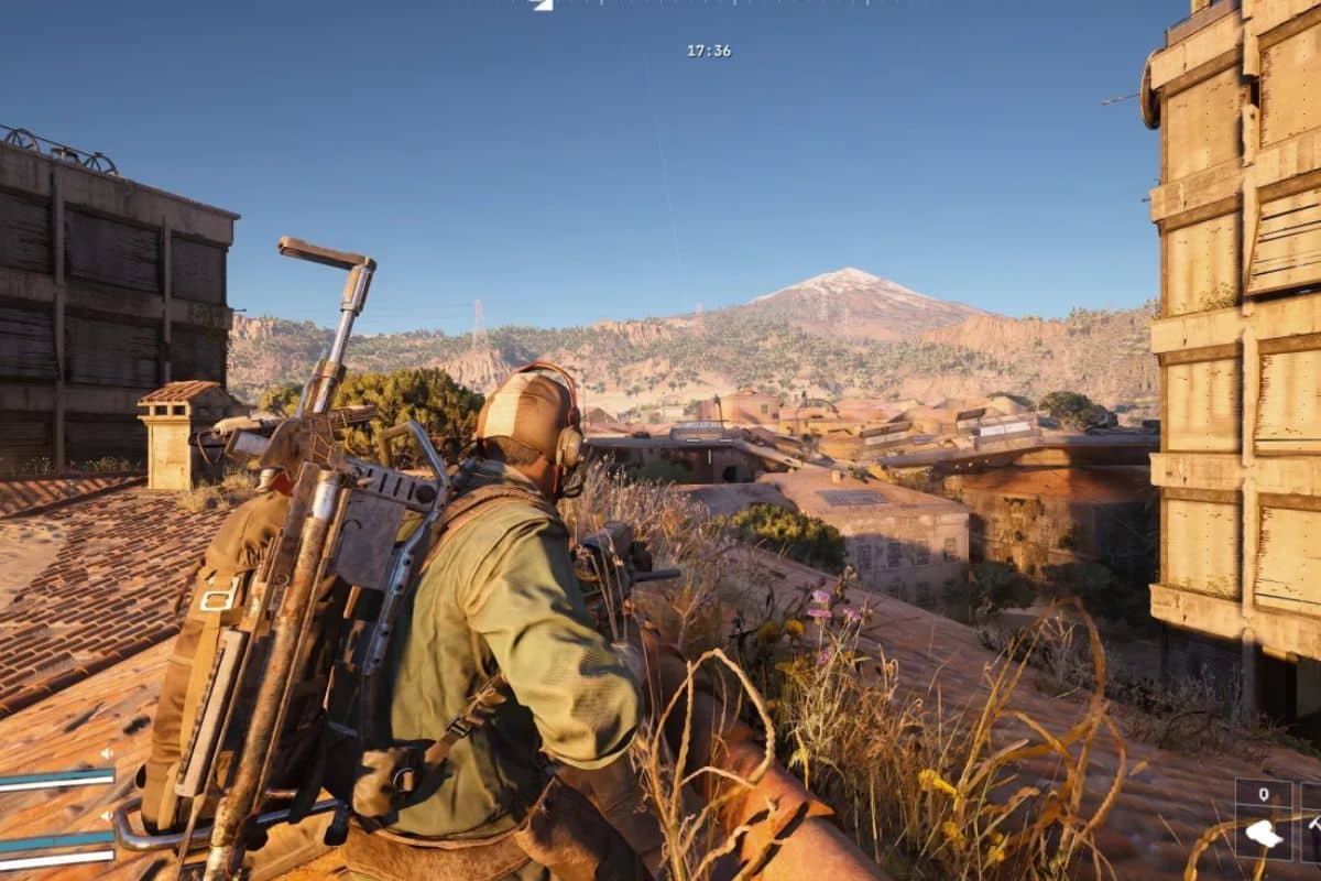 Joueur au sommet, montagne en arrière-plan.