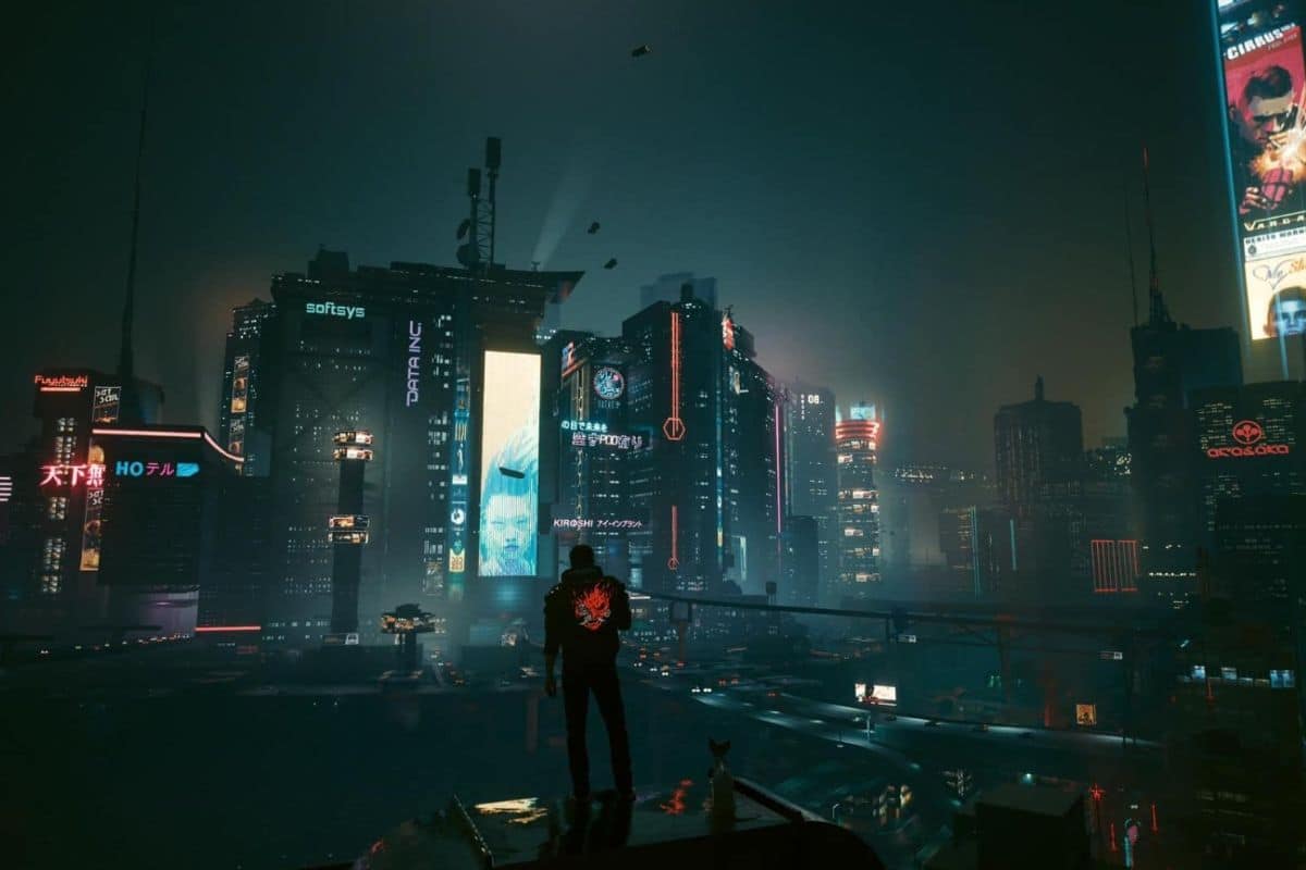 Homme observant une ville futuriste illuminée nuit.