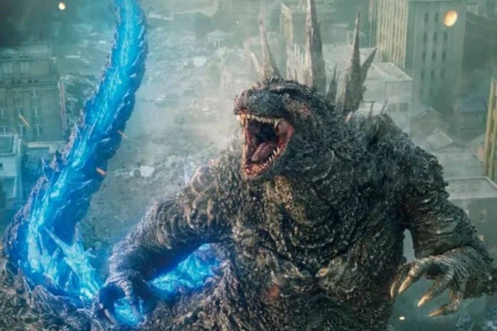 Monstre géant rugissant dans une ville en ruines.