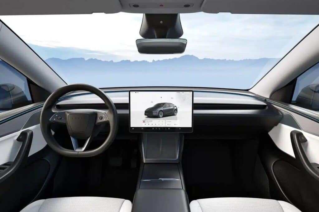 Intérieur moderne de voiture avec écran central.