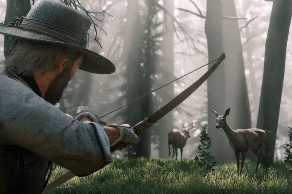 Chasseur vise cerfs dans la forêt brumeuse.