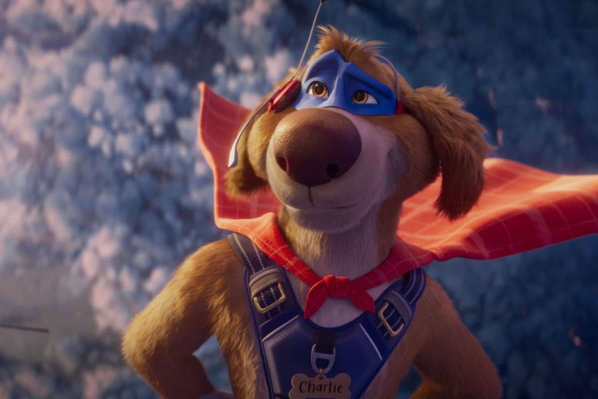 Chien anime portant un masque et une cape rouge.