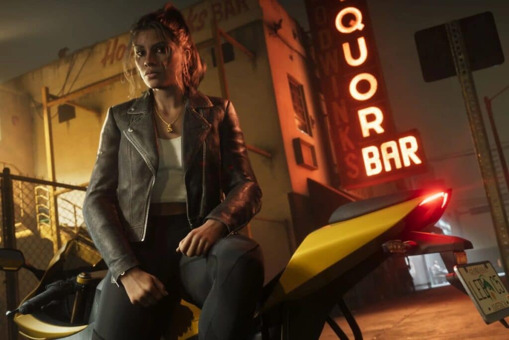 Femme sur moto devant un bar lumineux.