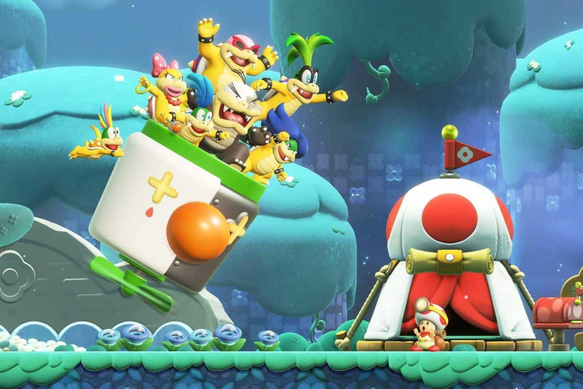 Personnages de jeu vidéo colorés sur une scène.